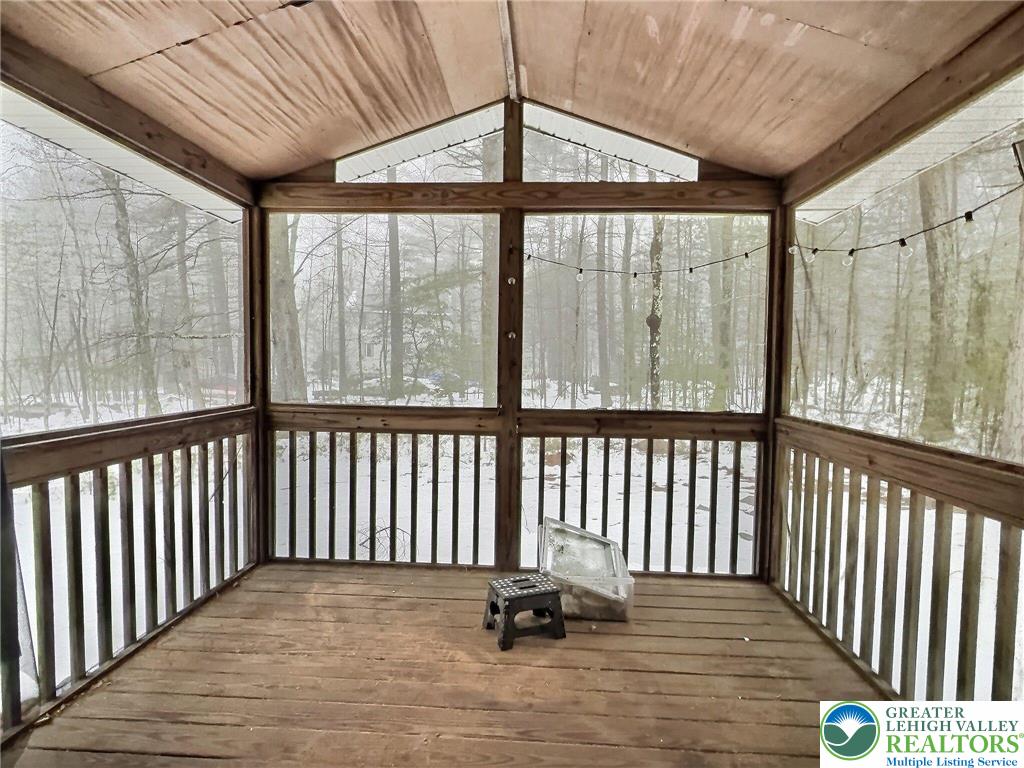 375 Marcel Drive Dingmans Ferry, PA 18328 - Photo 23 of 37 a view of a two chairs in the balcony