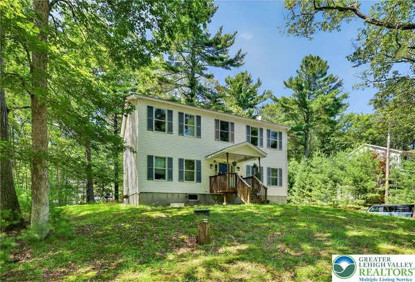 a view of a house with a lake view