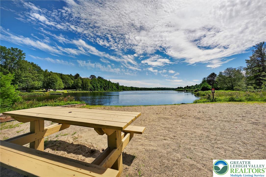 375 Marcel Drive Dingmans Ferry, PA 18328 - Photo 34 of 37 a view of a pool with a yard