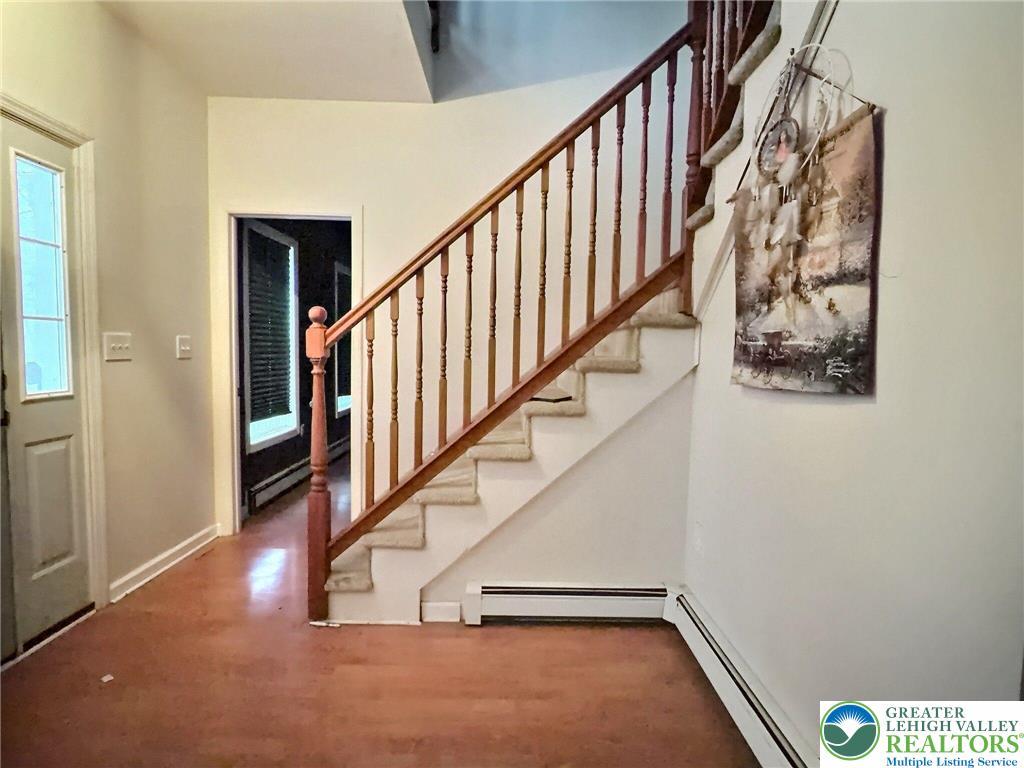 375 Marcel Drive Dingmans Ferry, PA 18328 - Photo 4 of 37 a view of staircase with white walls and a window