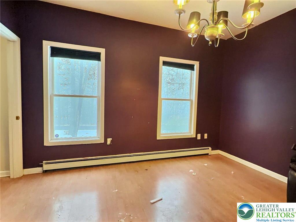 375 Marcel Drive Dingmans Ferry, PA 18328 - Photo 7 of 37 a view of an empty room with a window