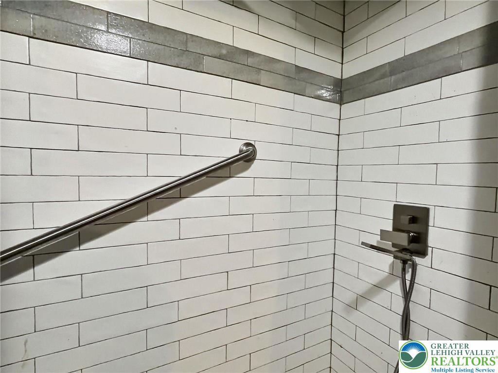 375 Marcel Drive Dingmans Ferry, PA 18328 - Photo 10 of 37 a bathroom with a shower