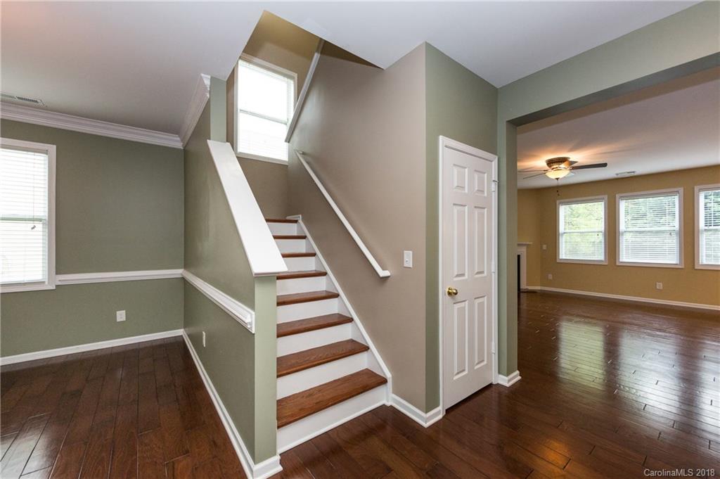 1132 Spicewood Pines Road Fort Mill, SC 29708 - Photo 14 of 24 a view of entryway and hall with wooden floor