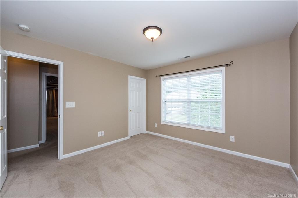 1132 Spicewood Pines Road Fort Mill, SC 29708 - Photo 18 of 24 a view of an empty room with a window