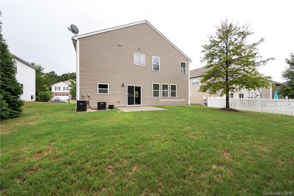 1132 Spicewood Pines Road Fort Mill, SC 29708 - Photo 23 of 24 a view of a house with backyard
