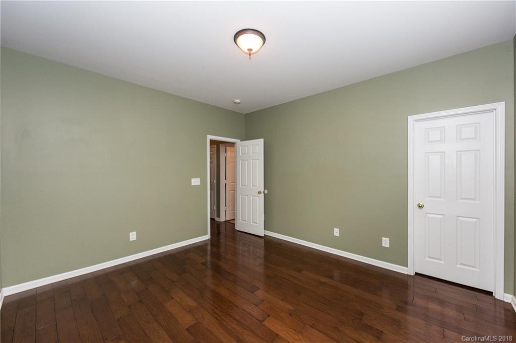1132 Spicewood Pines Road Fort Mill, SC 29708 - Photo 5 of 24 a view of an empty room with wooden floor