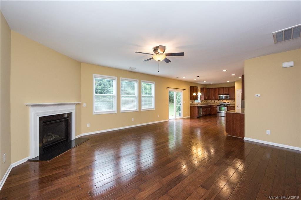 1132 Spicewood Pines Road Fort Mill, SC 29708 - Photo 9 of 24 a view of living room with furniture and a fireplace