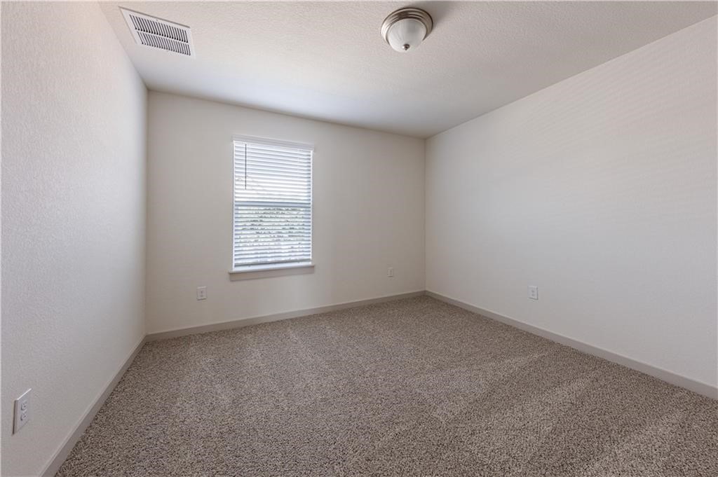 1801 Bonham Lane Round Rock, TX 78664 - Photo 14 of 24 an empty room with a window