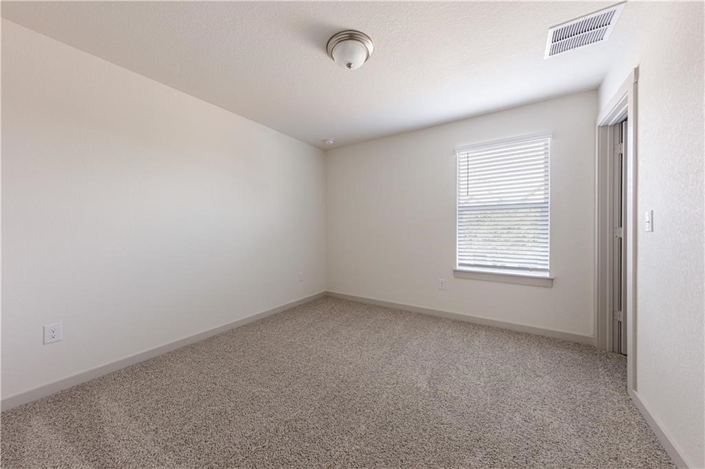 1801 Bonham Lane Round Rock, TX 78664 - Photo 16 of 24 an empty room with a window