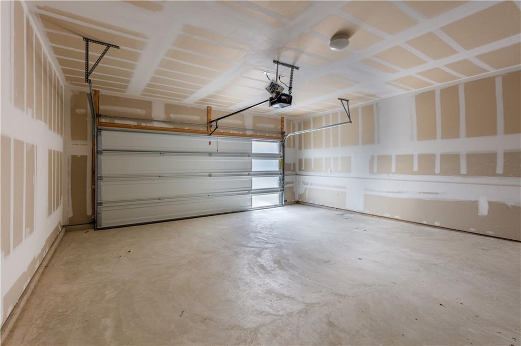 1801 Bonham Lane Round Rock, TX 78664 - Photo 17 of 24 a view of an empty room with a white walls