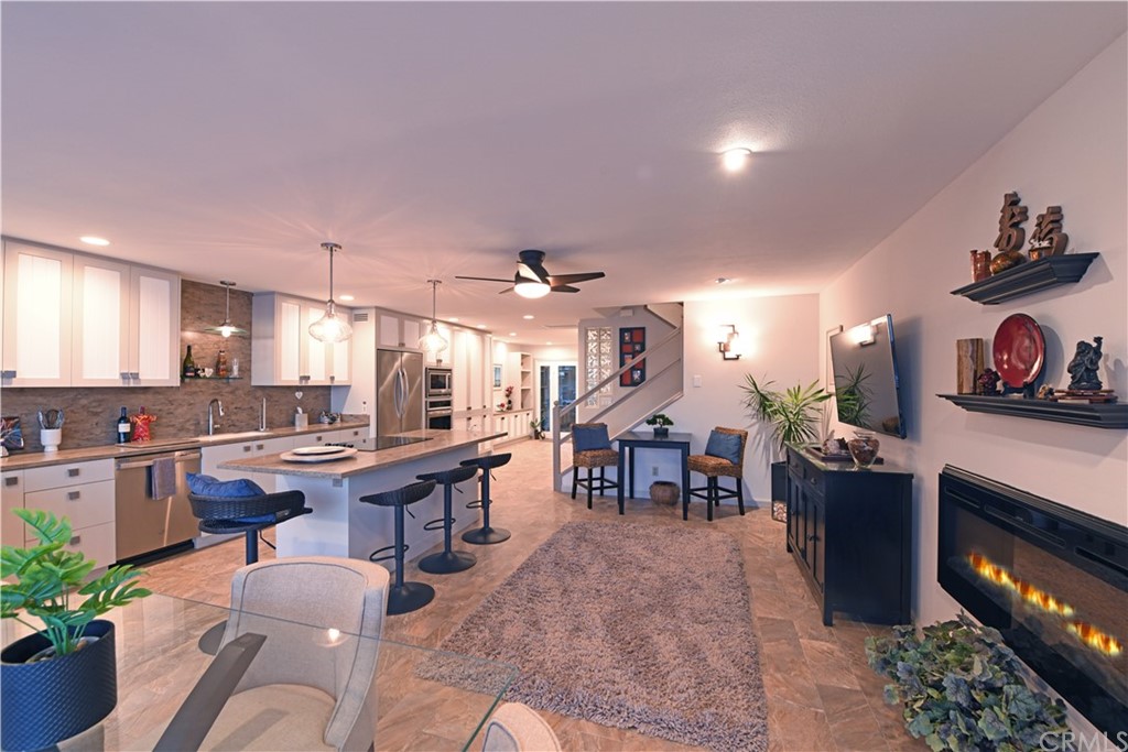 106 Blue Lagoon Laguna Beach, CA 92651 - Photo 11 of 46 a kitchen with lots of counter top space and furniture