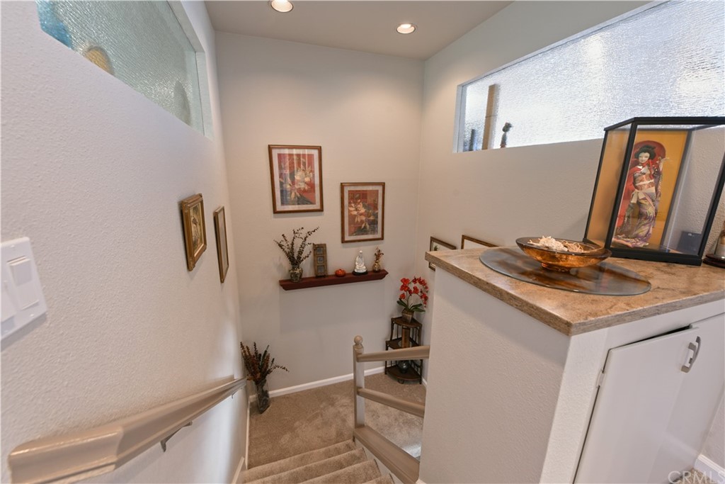 106 Blue Lagoon Laguna Beach, CA 92651 - Photo 16 of 46 a bathroom with a sink and a mirror