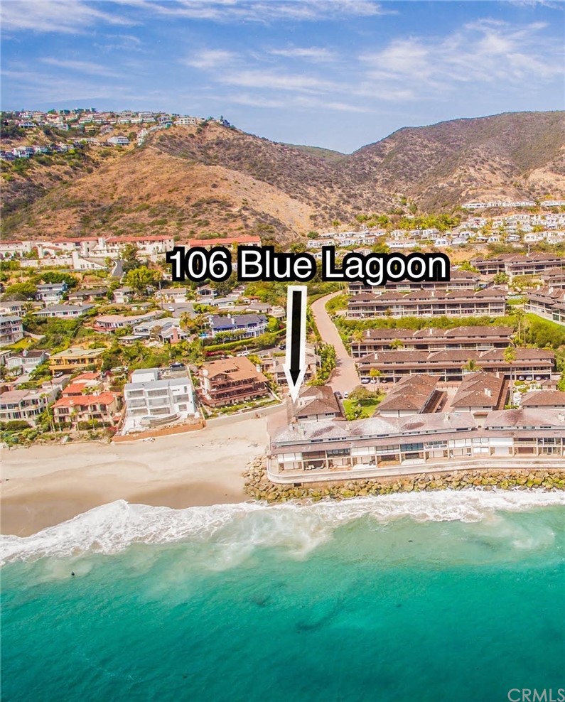 106 Blue Lagoon Laguna Beach, CA 92651 - Photo 39 of 46 a view of an ocean with a mountain