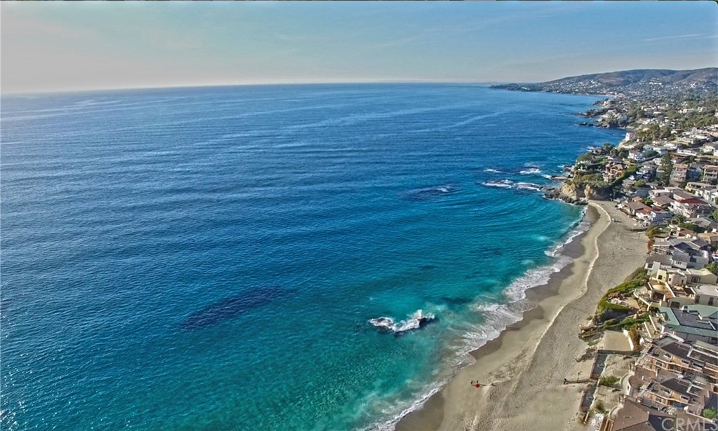 106 Blue Lagoon Laguna Beach, CA 92651 - Photo 44 of 46 an aerial view of a house with a yard