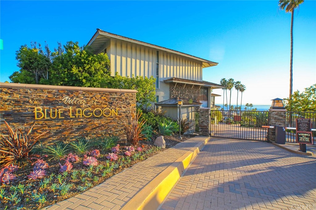 106 Blue Lagoon Laguna Beach, CA 92651 - Photo 45 of 46 a front view of a house with a yard