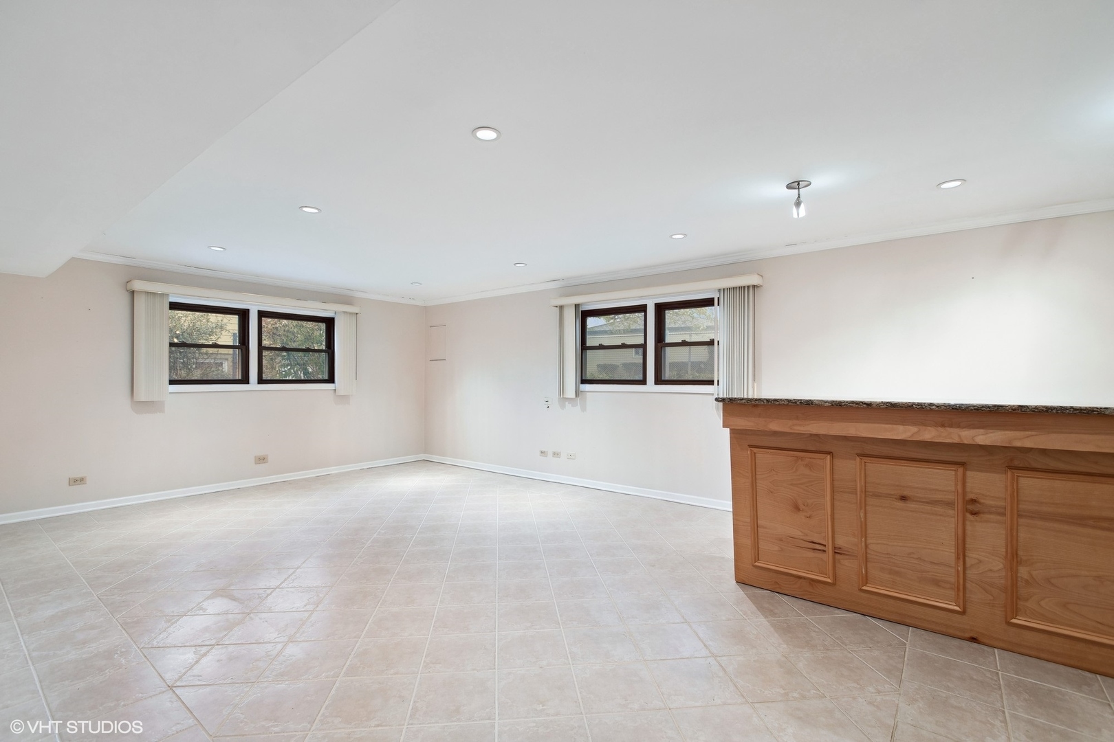 7604 Beckwith Road Morton Grove, IL 60053 - Photo 12 of 20 a view of an empty room with windows