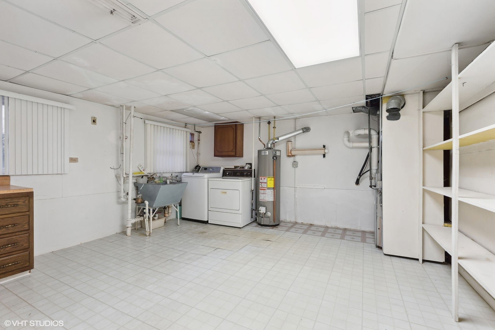 7604 Beckwith Road Morton Grove, IL 60053 - Photo 13 of 20 a storage room with cabinets