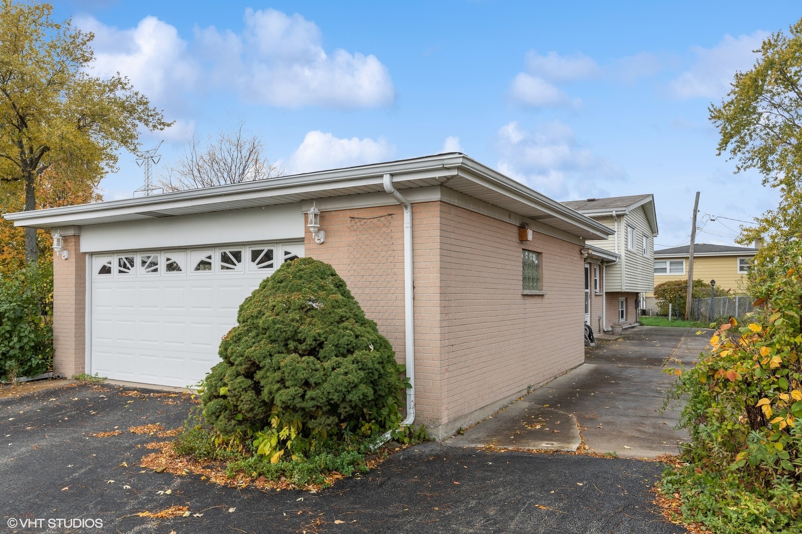 7604 Beckwith Road Morton Grove, IL 60053 - Photo 16 of 20 a front view of a house with a garden