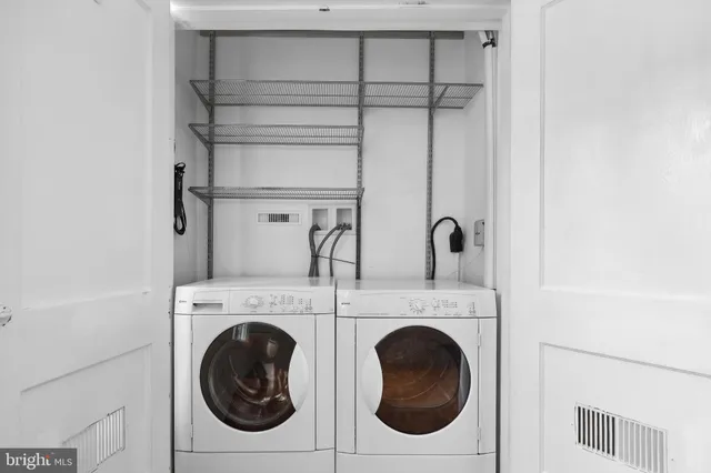 a utility room with dryer and washer