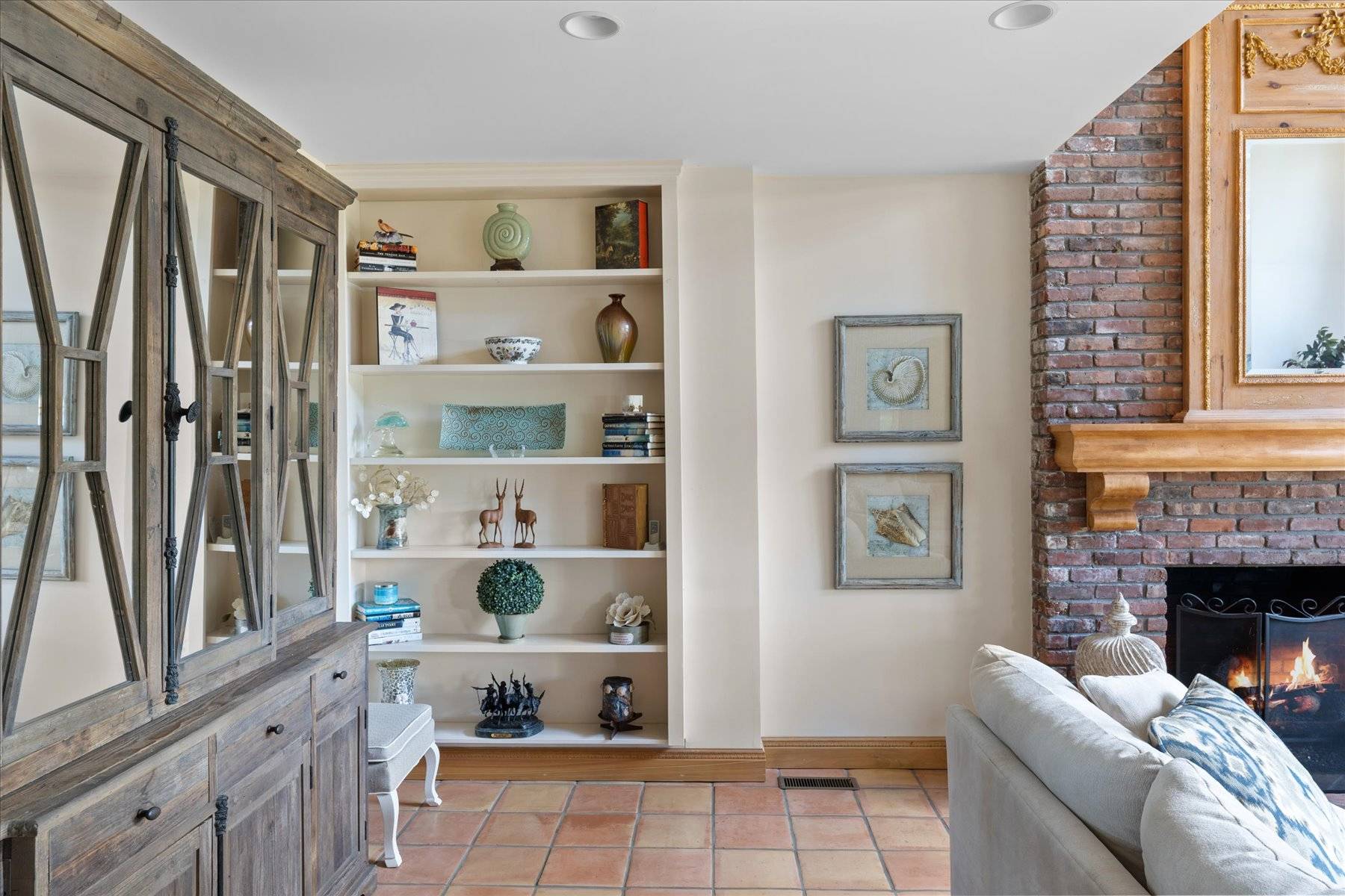 25 Quantuck Bay Lane Westhampton Beach, NY 11978 - Photo 11 of 38 a living room with furniture and a fireplace