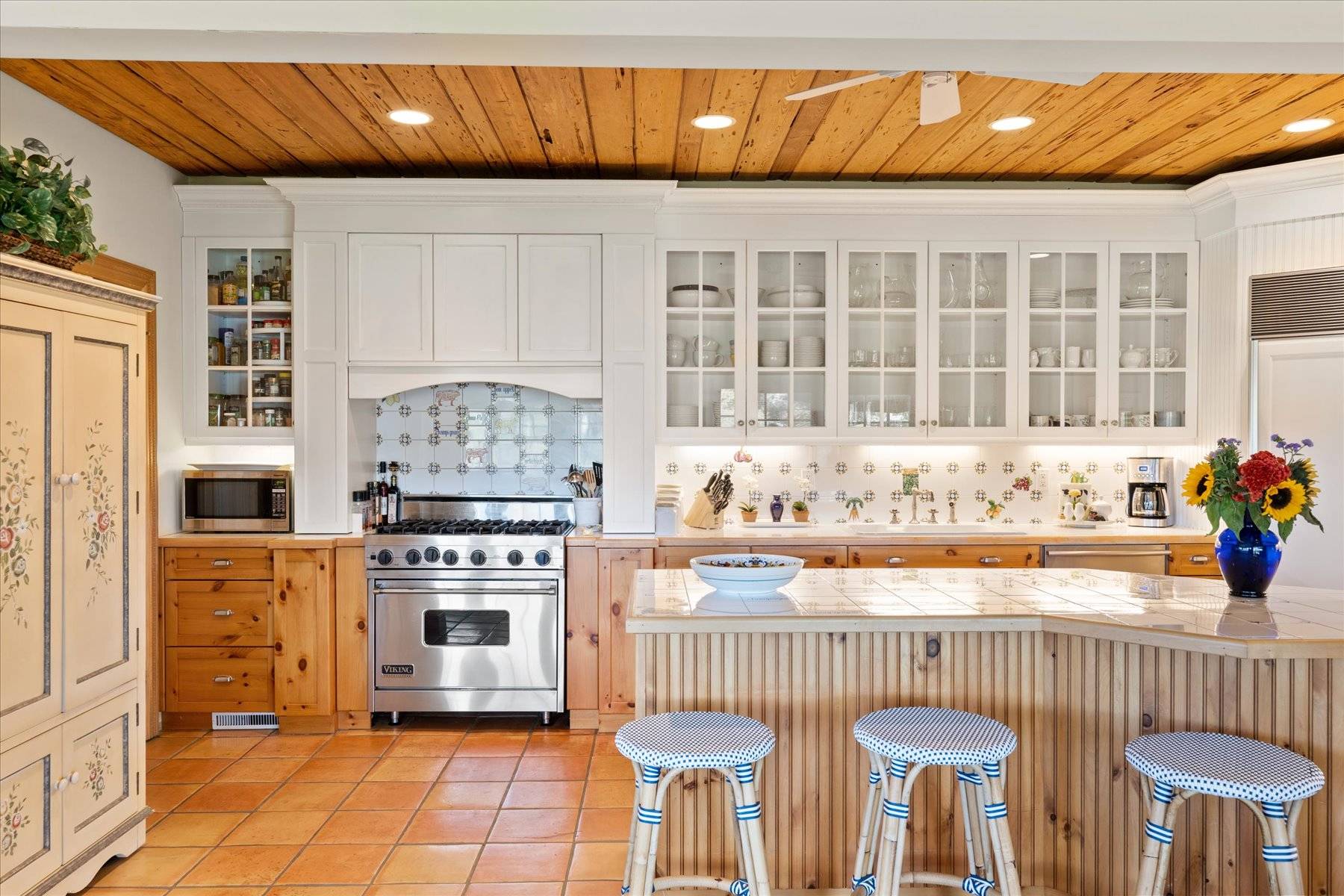 25 Quantuck Bay Lane Westhampton Beach, NY 11978 - Photo 15 of 38 a kitchen with stainless steel appliances granite countertop a stove and a cabinets