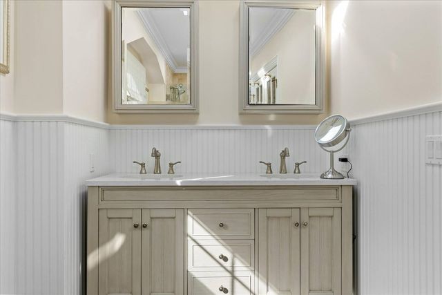 a view of cabinets a sink and a window
