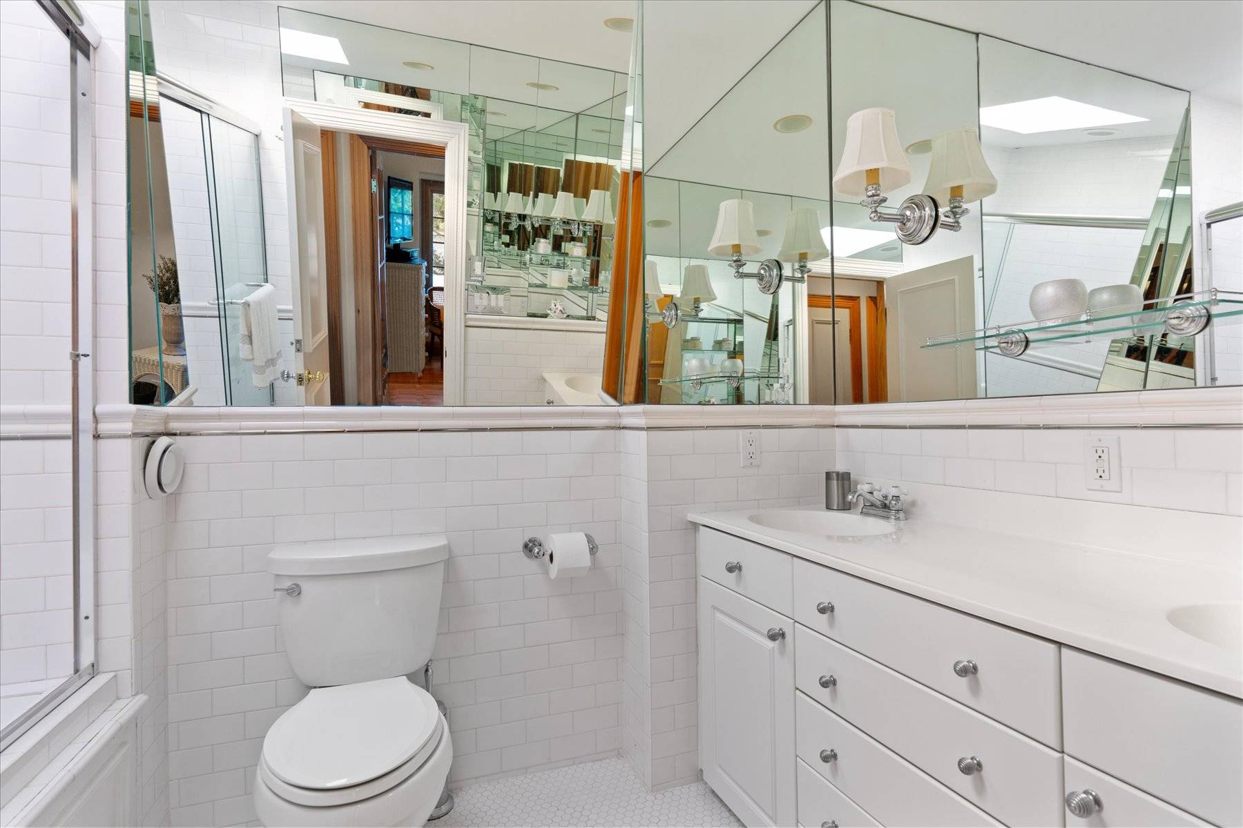 25 Quantuck Bay Lane Westhampton Beach, NY 11978 - Photo 28 of 38 a bathroom with a sink a toilet and shower