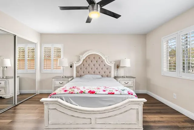 a room with a bed and window