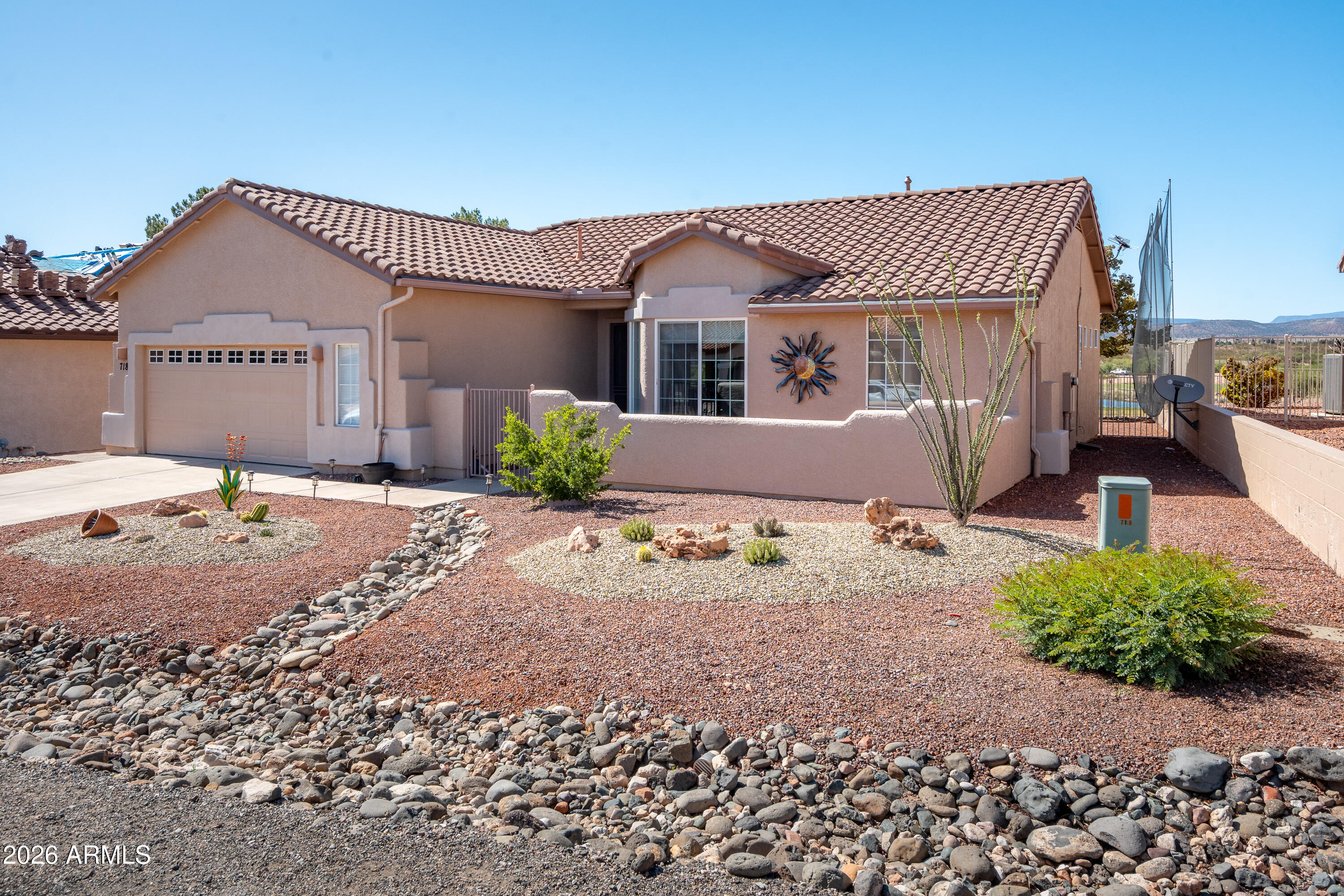 718 South Wandering River Road Cornville, AZ 86325 - Photo 41 of 41 a front view of a house with a yard