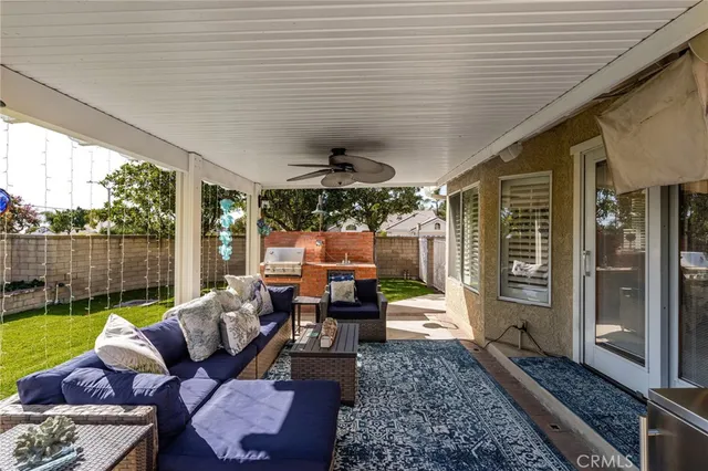a view of a backyard with sitting area