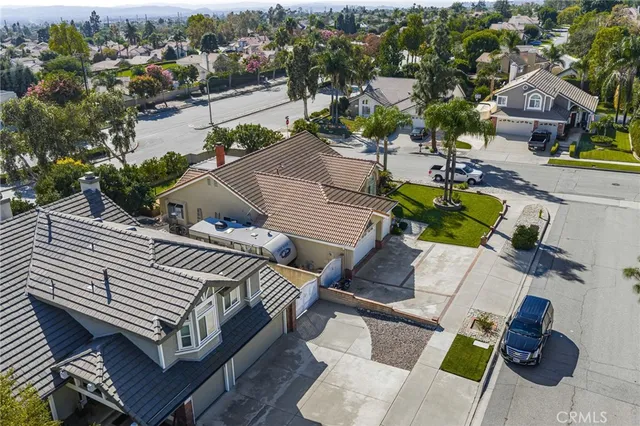 an aerial view of a house with outdoor space