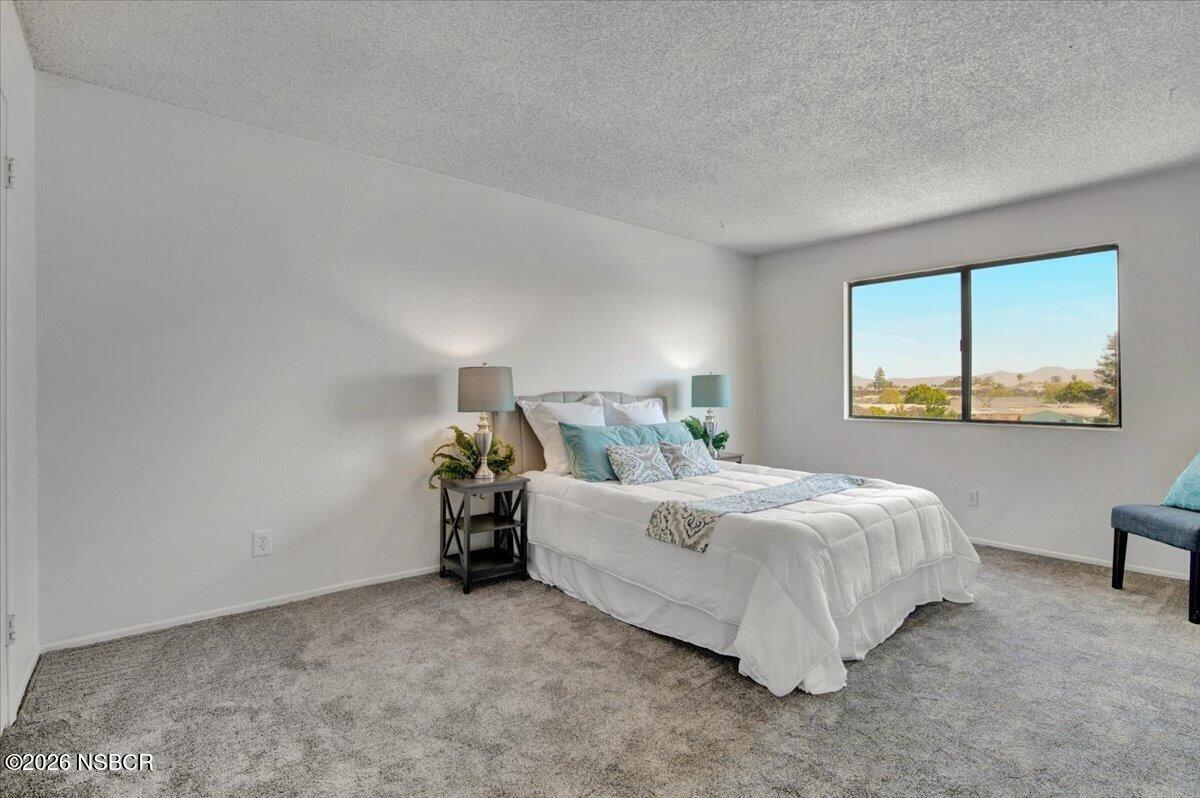 3400 Santa Maria Way, Unit 207B Santa Maria, CA 93455 - Photo 28 of 50 a room with a bed and a window