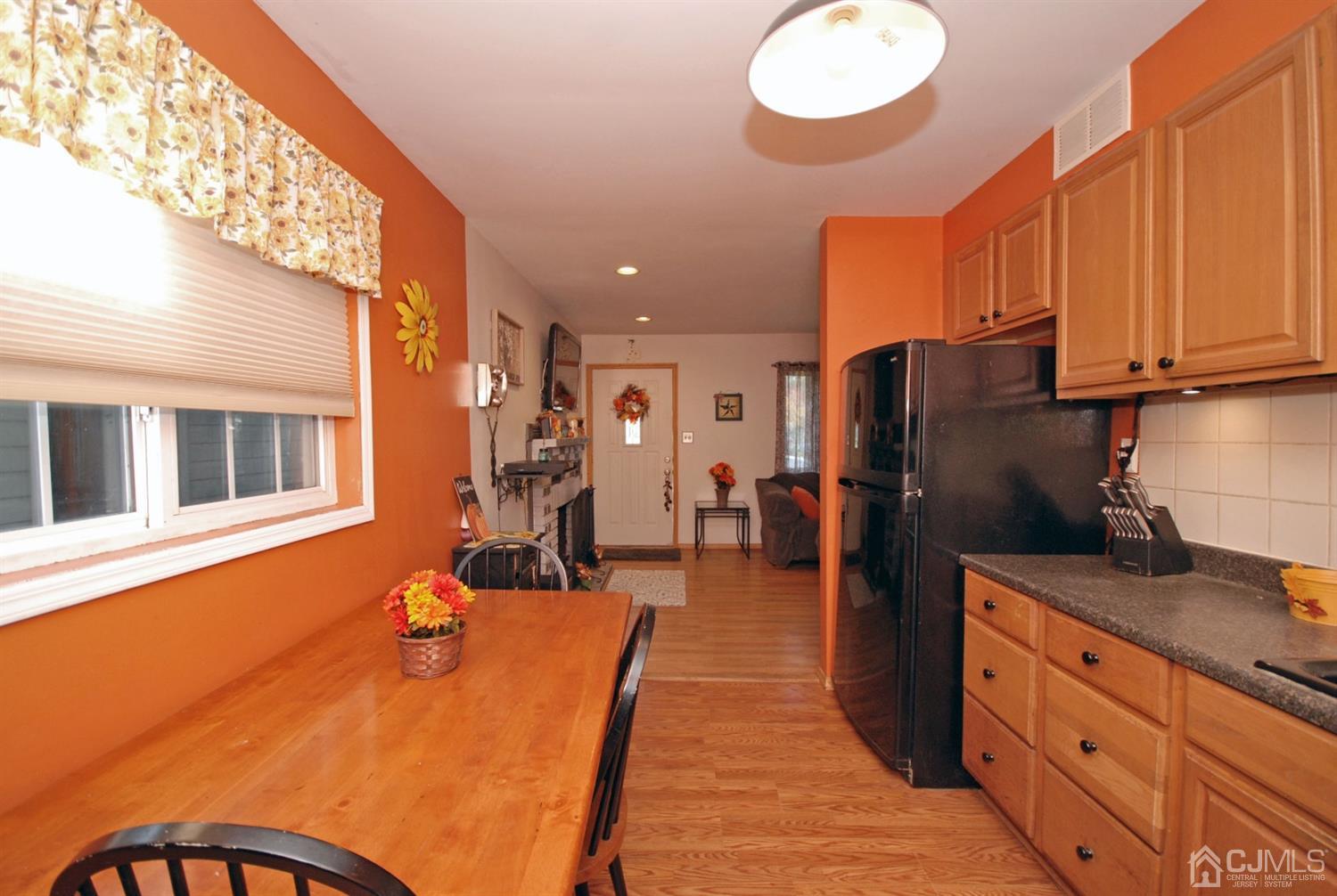 18 Crescent Road Edison, NJ 08817 - Photo 12 of 28 a kitchen with stainless steel appliances granite countertop a sink refrigerator and cabinets
