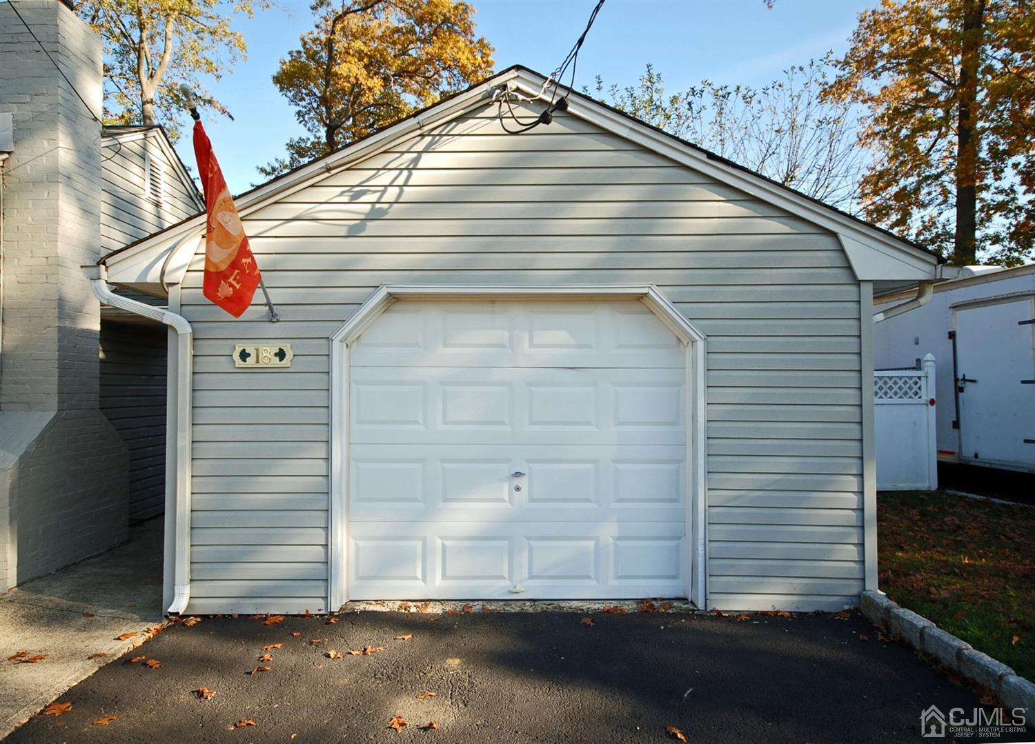 18 Crescent Road Edison, NJ 08817 - Photo 22 of 28 a view of a house with a garage