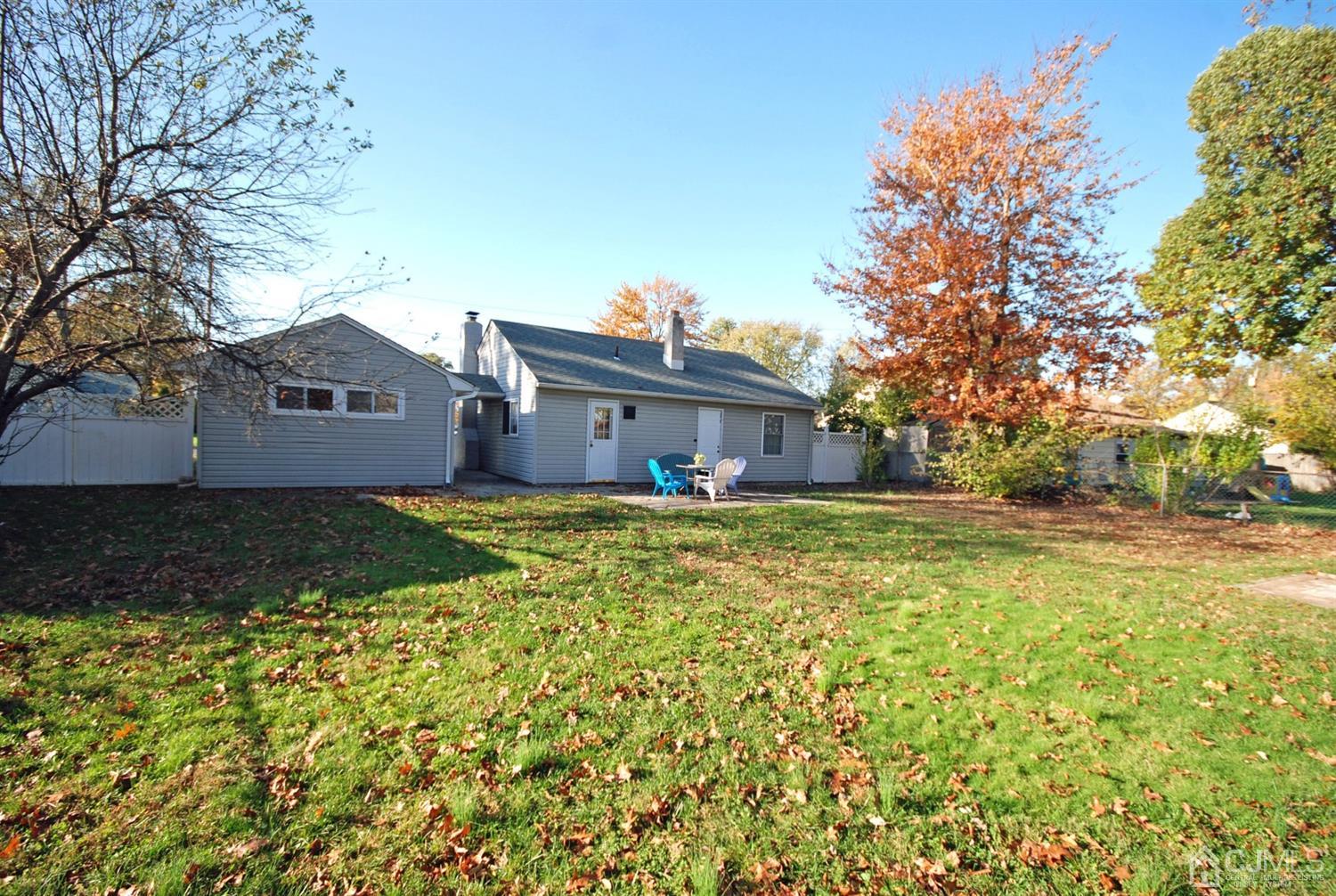 18 Crescent Road Edison, NJ 08817 - Photo 27 of 28 a front view of a house with a garden