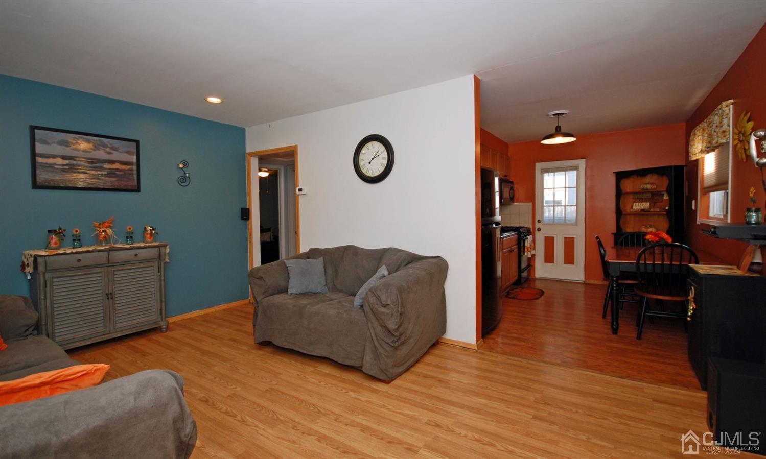 18 Crescent Road Edison, NJ 08817 - Photo 9 of 28 a living room with furniture and a flat screen tv