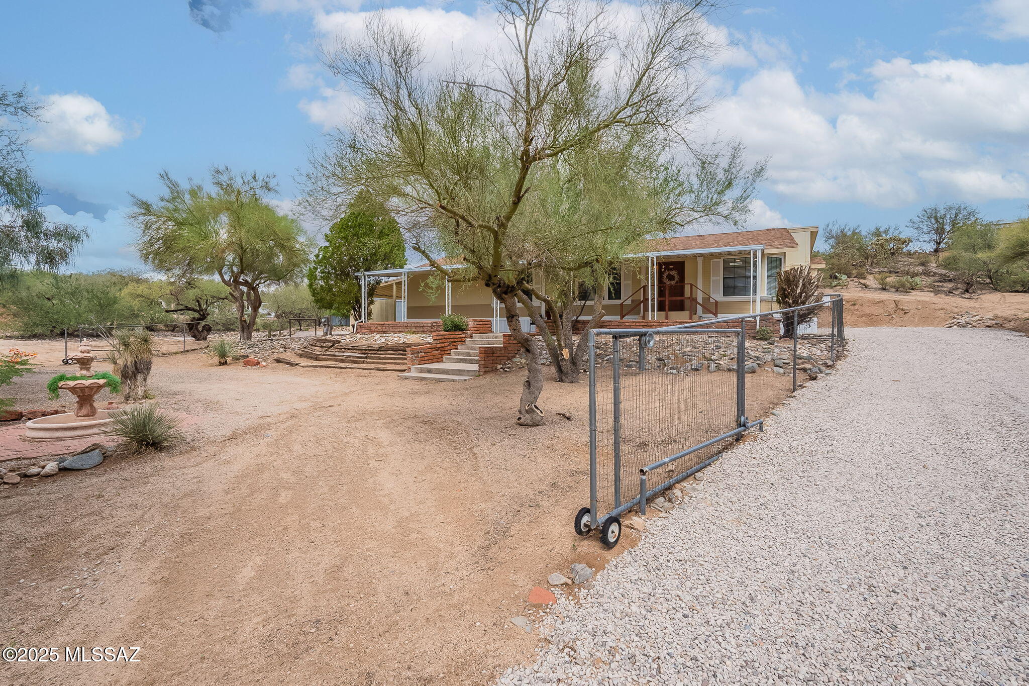 4081 East Rollins Road Tucson, AZ 85739 - Photo 34 of 44 Enclosed front with gates that drive thru