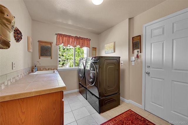 a room with painting and a table