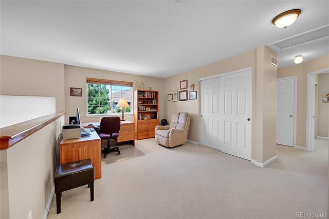 a room with furniture and a window