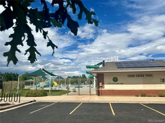 a view of a building with a street