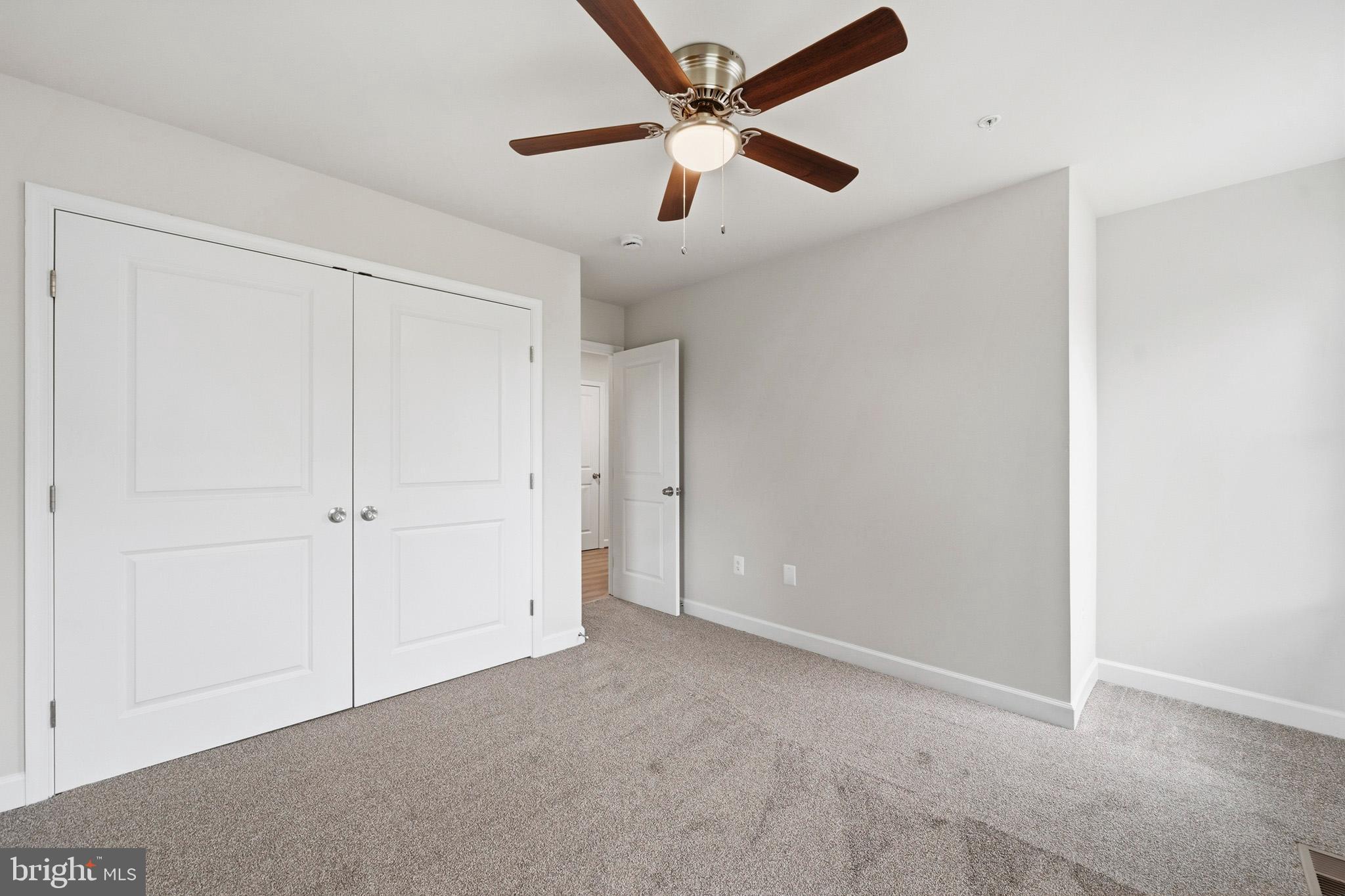 29725 Bruce Road Mechanicsville, MD 20659 - Photo 70 of 79 an empty room with closet and windows