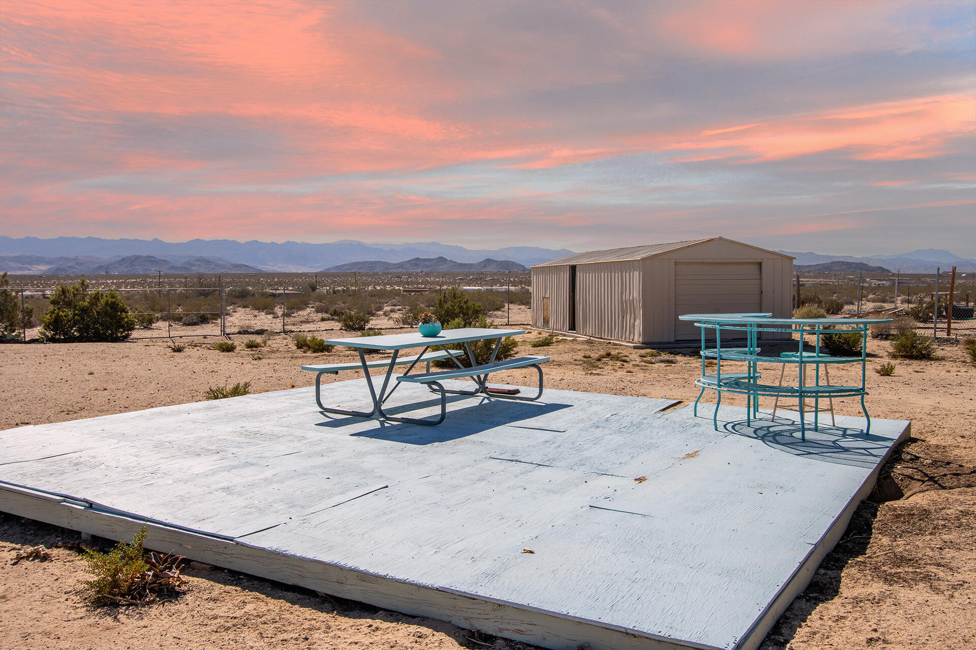 66621 Daisy Lane Joshua Tree, CA 92252 - Photo 21 of 53 a view of a terrace with chairs