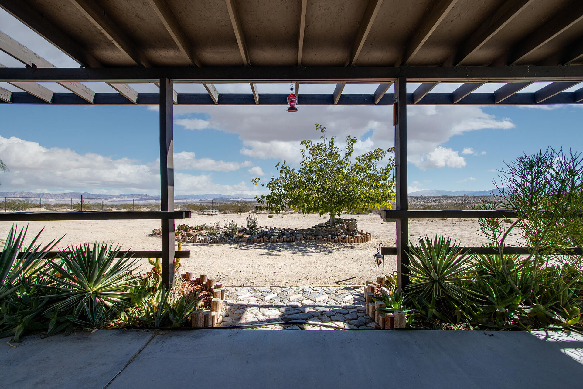 66621 Daisy Lane Joshua Tree, CA 92252 - Photo 29 of 53 a view of a entryway door front of house