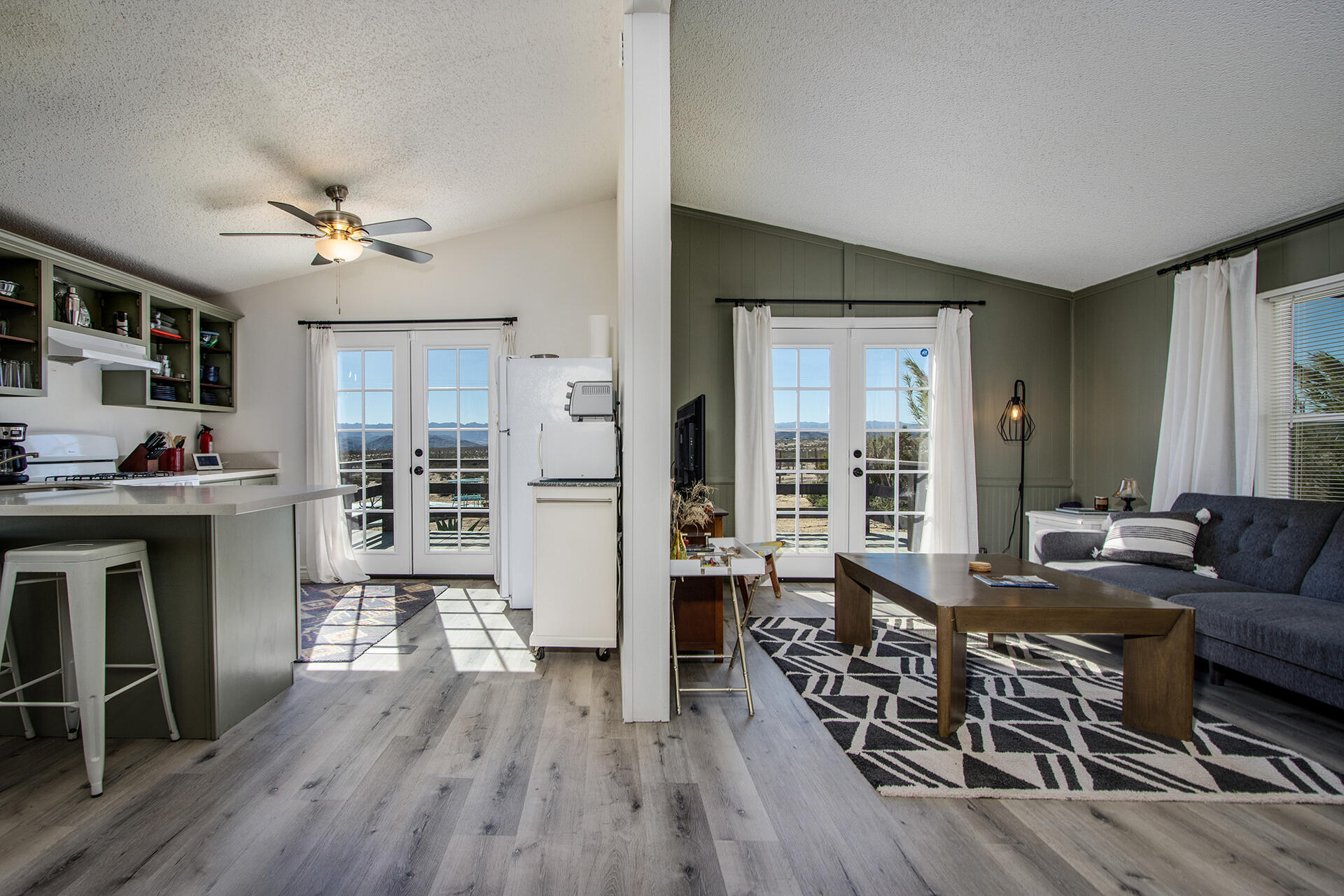 66621 Daisy Lane Joshua Tree, CA 92252 - Photo 31 of 53 a living room with furniture fireplace and wooden floor