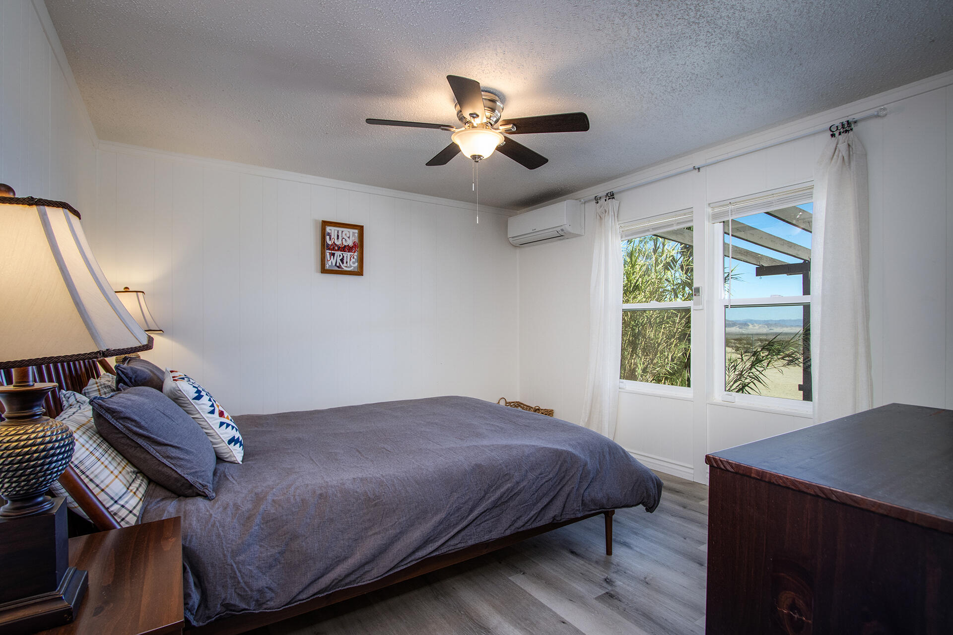 66621 Daisy Lane Joshua Tree, CA 92252 - Photo 45 of 53 a bedroom with a bed and a window