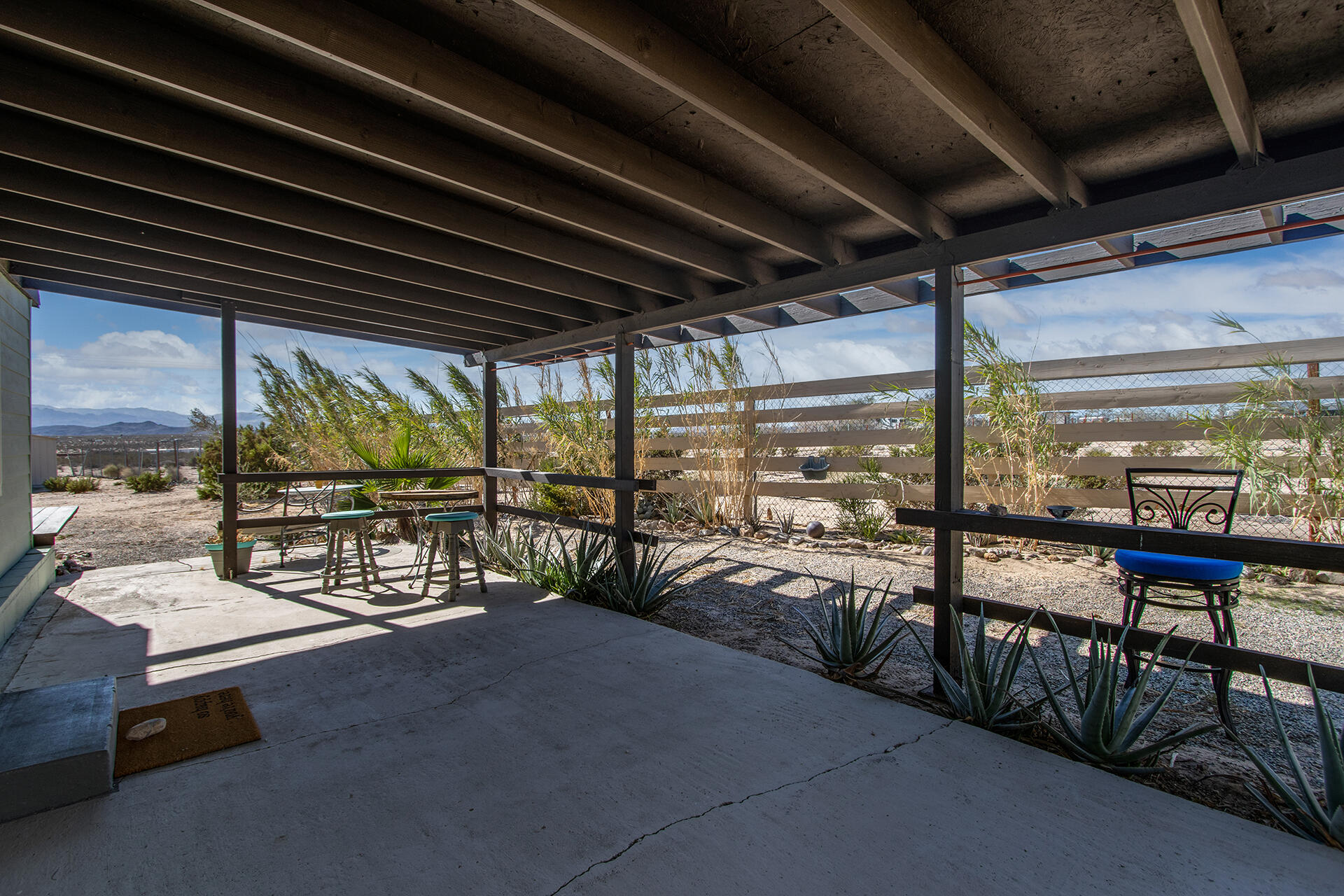 66621 Daisy Lane Joshua Tree, CA 92252 - Photo 47 of 53 a view of a porch with furniture