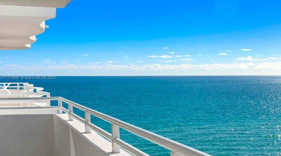 a view of balcony with ocean view