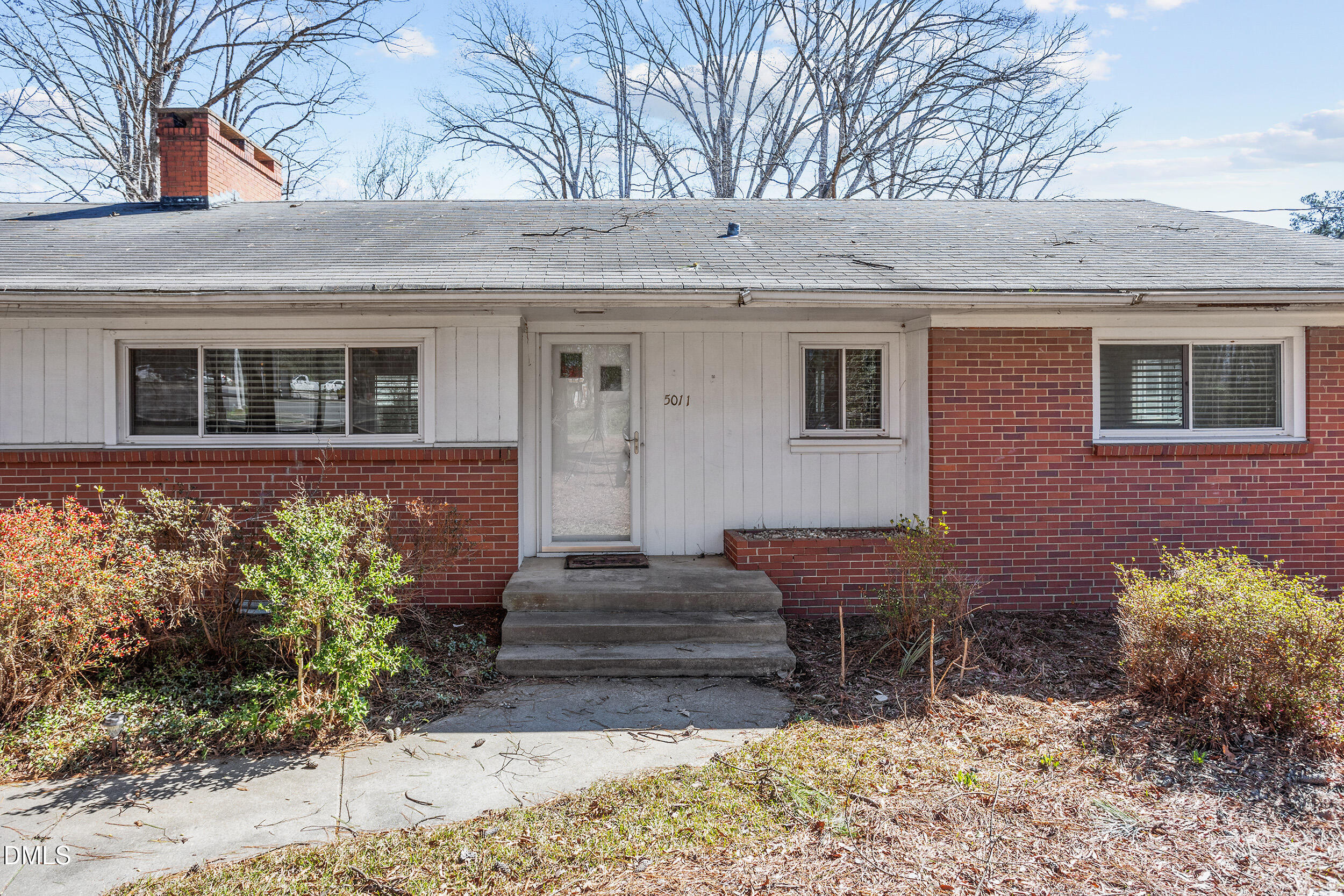 5011 Old Stage Road Raleigh, NC 27603 - Photo 6 of 29 a front view of a house with garden