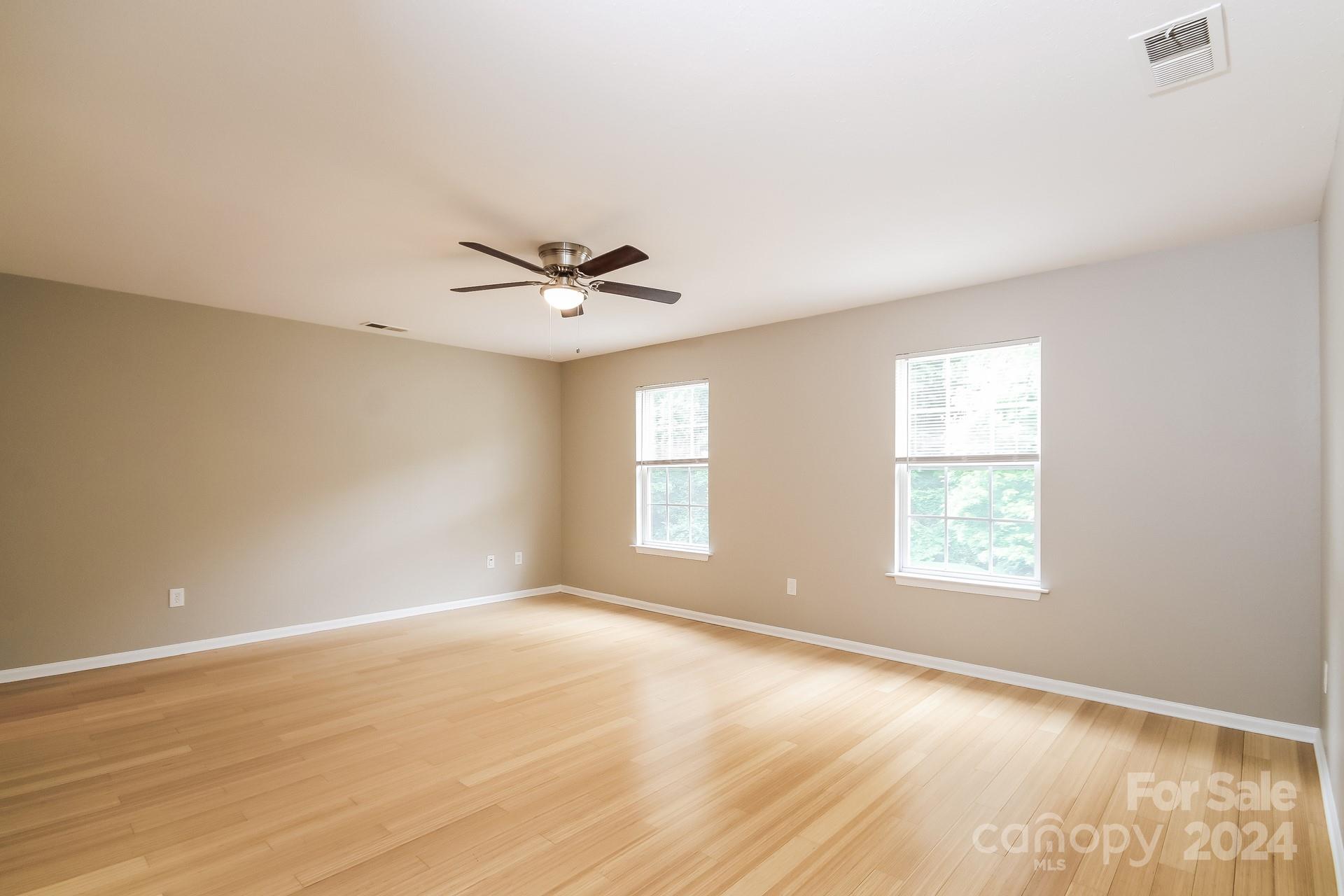 2315 Gooseberry Road Charlotte, NC 28208 - Photo 11 of 22 a view of a livingroom with a window and a kitchen