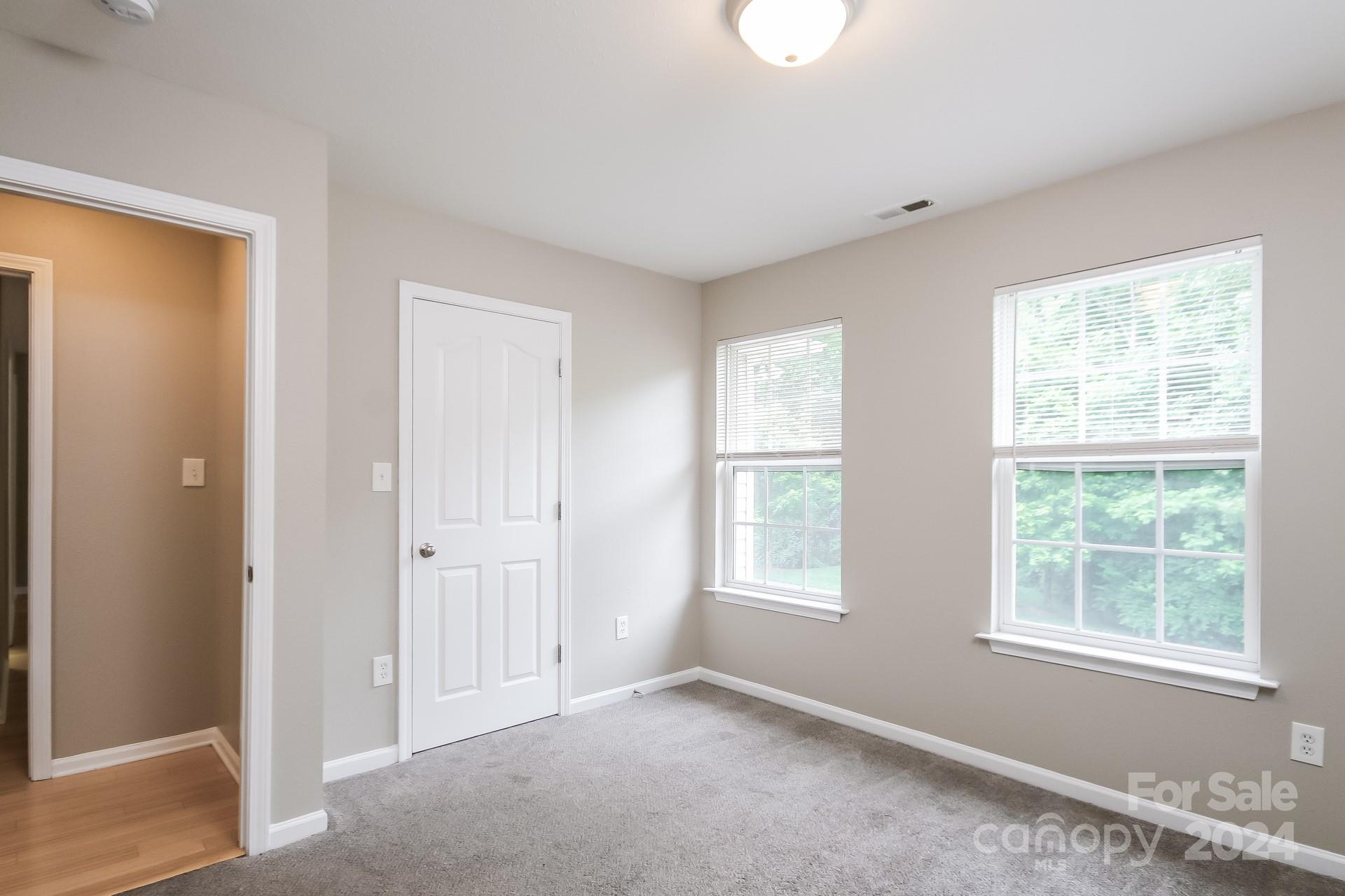 2315 Gooseberry Road Charlotte, NC 28208 - Photo 19 of 22 an empty room with windows